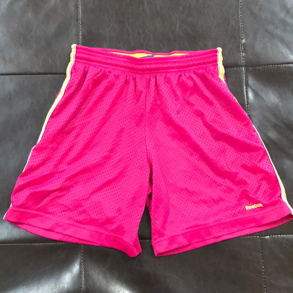 Pink athletic long shorts by Reebok!! Size small!!